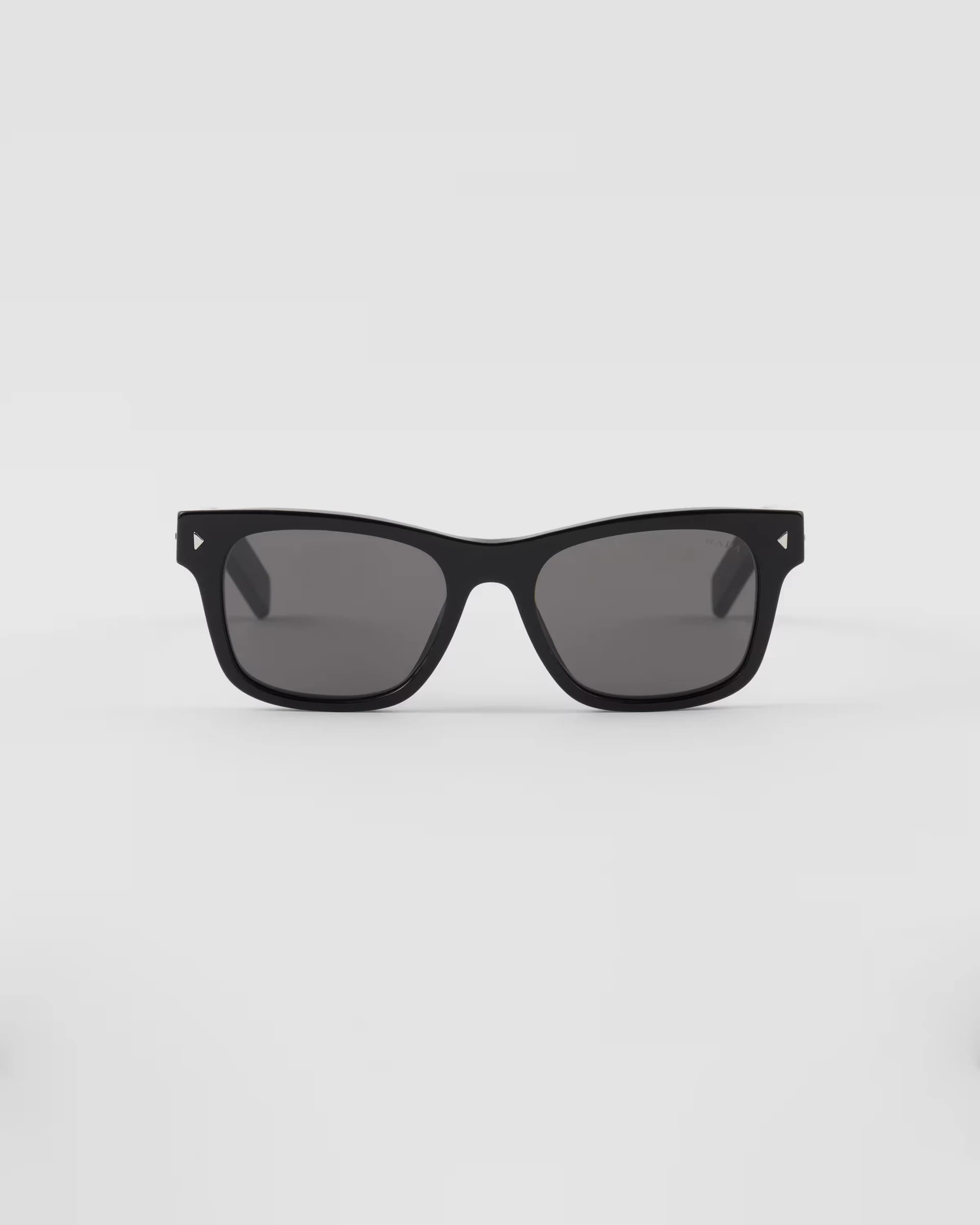 Prada Sunglasses With Iconic Metal Plaque