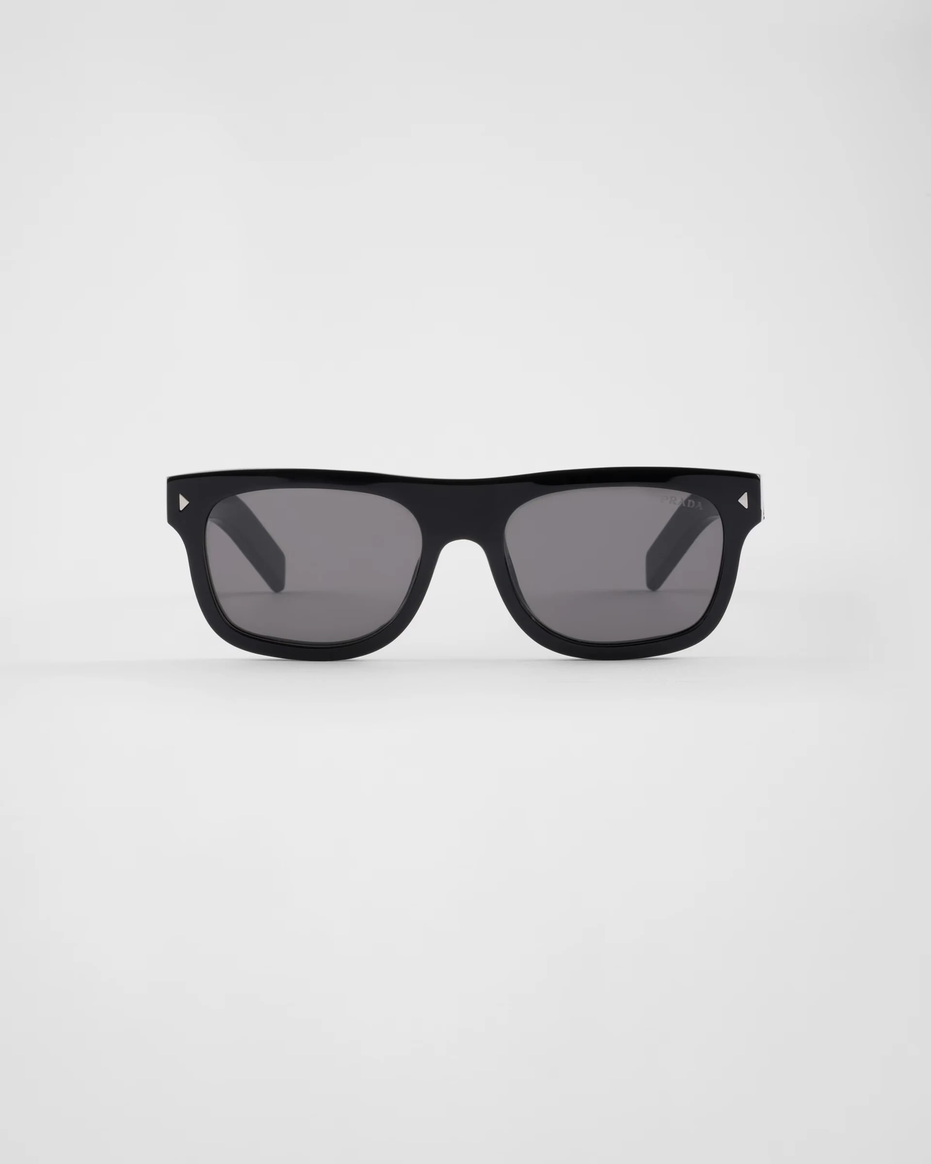 Prada Sunglasses With The Iconic Metal Plaque
