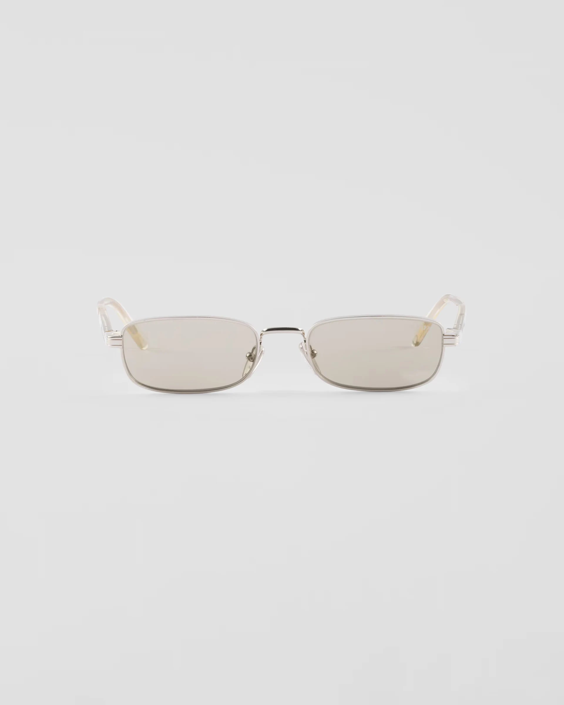 Prada Sunglasses With The Iconic Metal Plaque