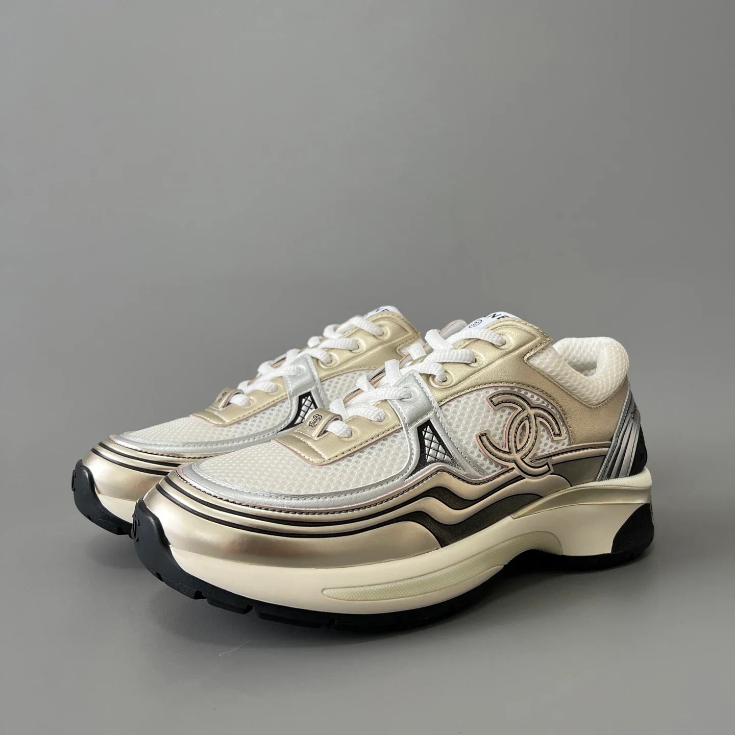 Chanel Laminated Calfskin & Suede Calfskin Sneakers