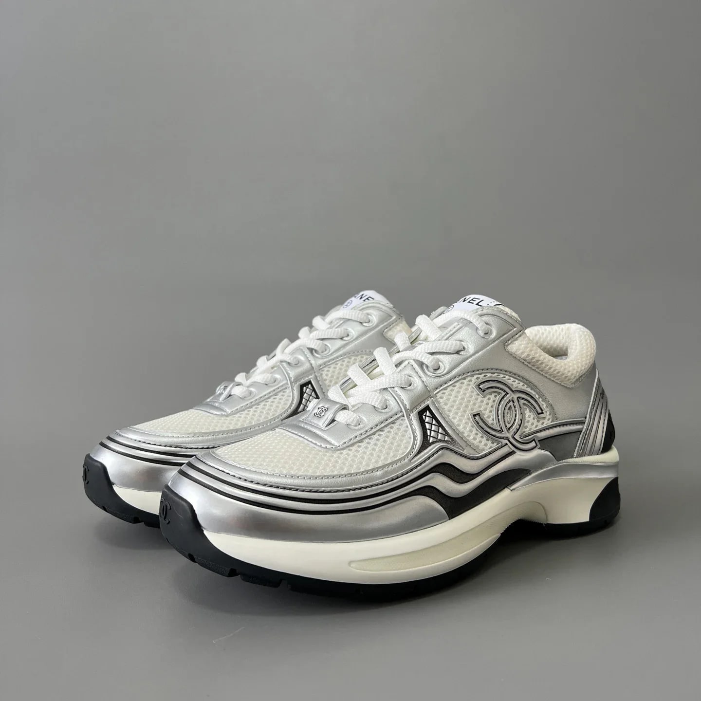 Chanel Laminated Calfskin & Suede Calfskin Sneakers