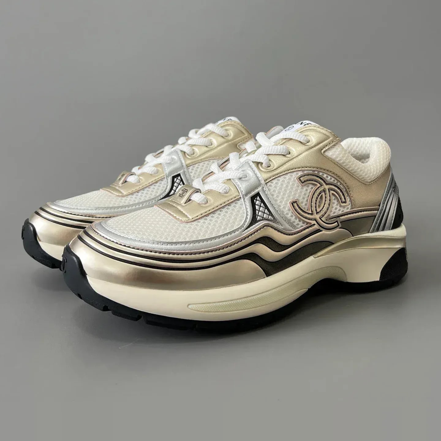 Chanel Laminated Calfskin & Suede Calfskin Sneakers