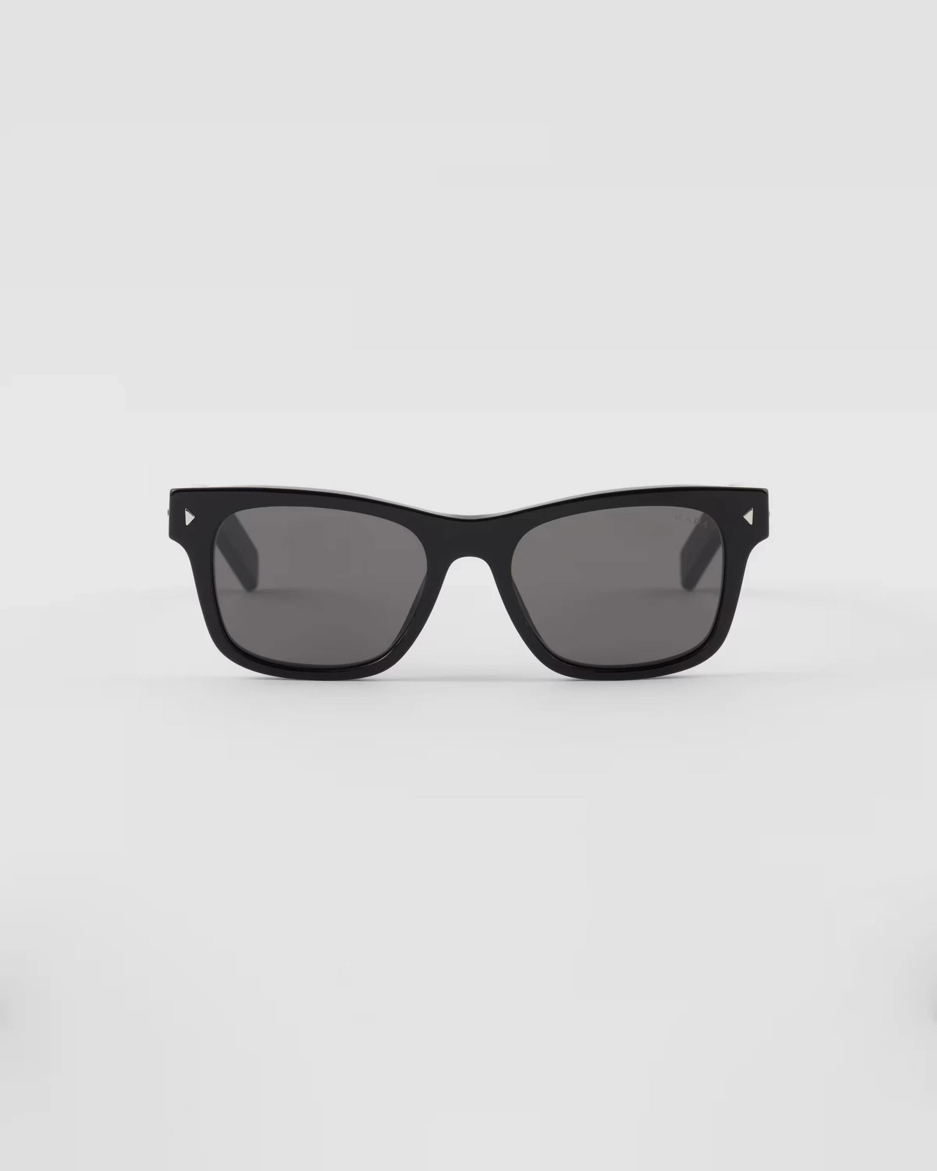 Prada Sunglasses With Iconic Metal Plaque