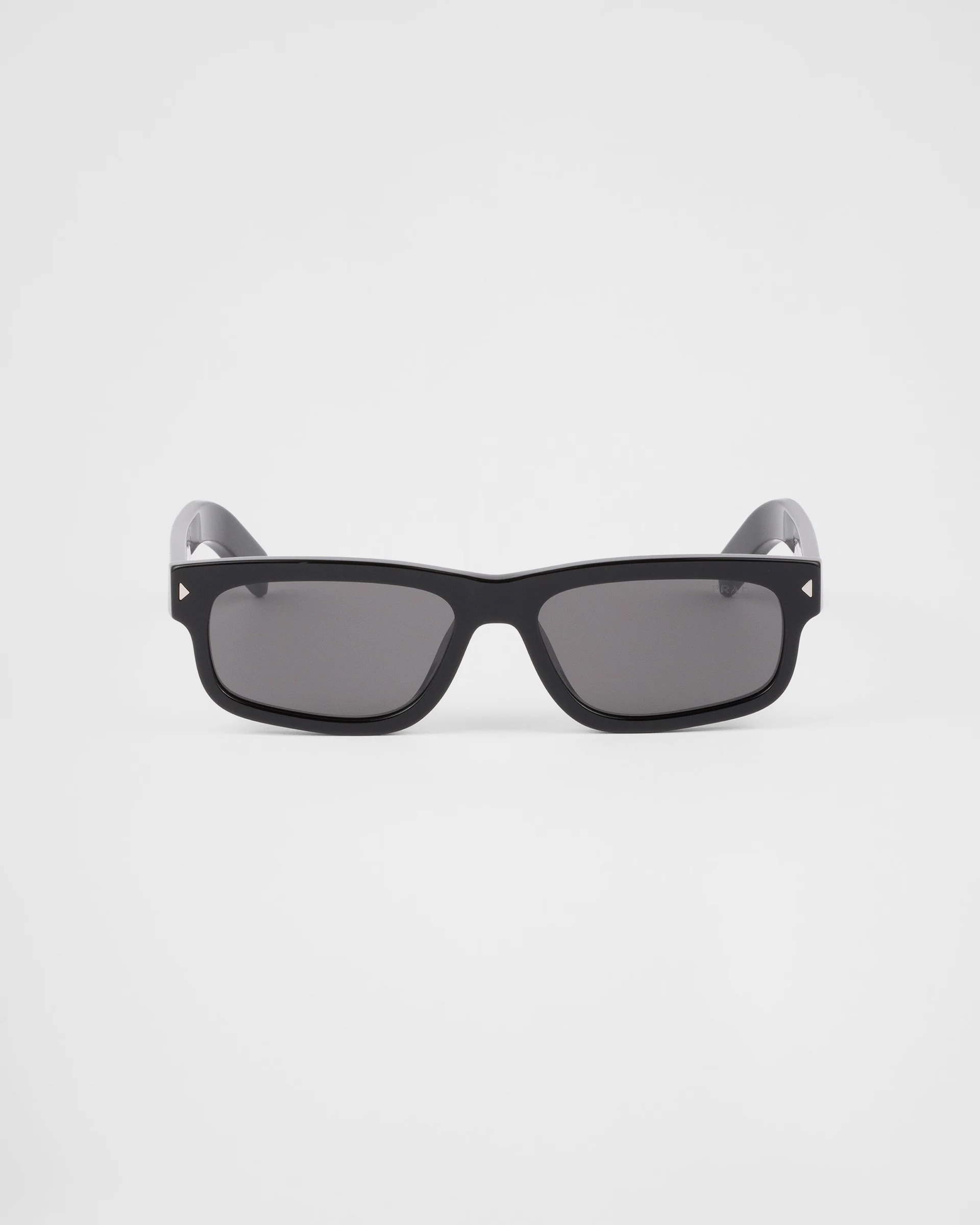 Prada Sunglasses With The Iconic Metal Plaque