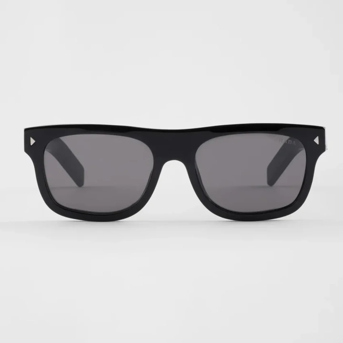 Prada Sunglasses With The Iconic Metal Plaque