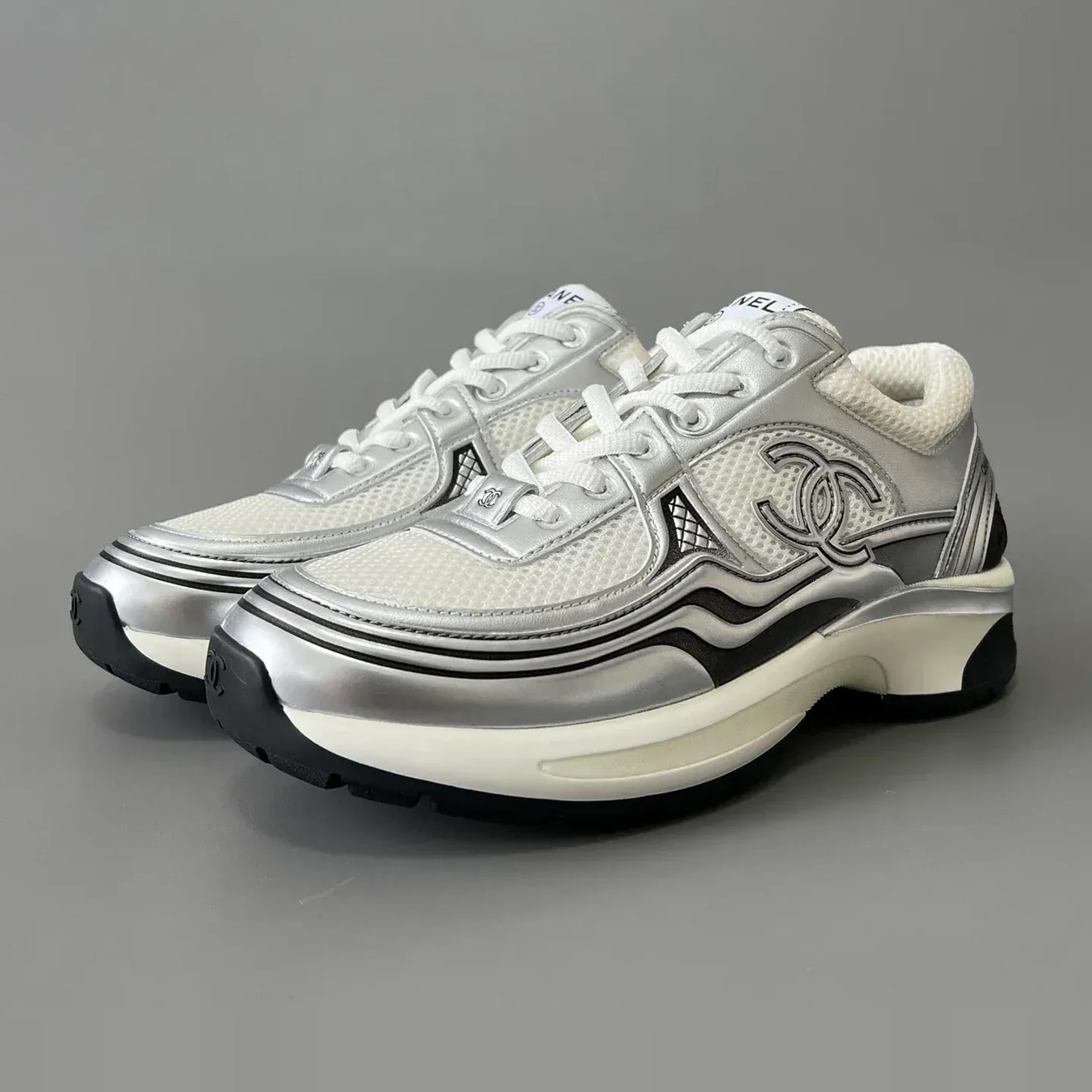 Chanel Laminated Calfskin & Suede Calfskin Sneakers
