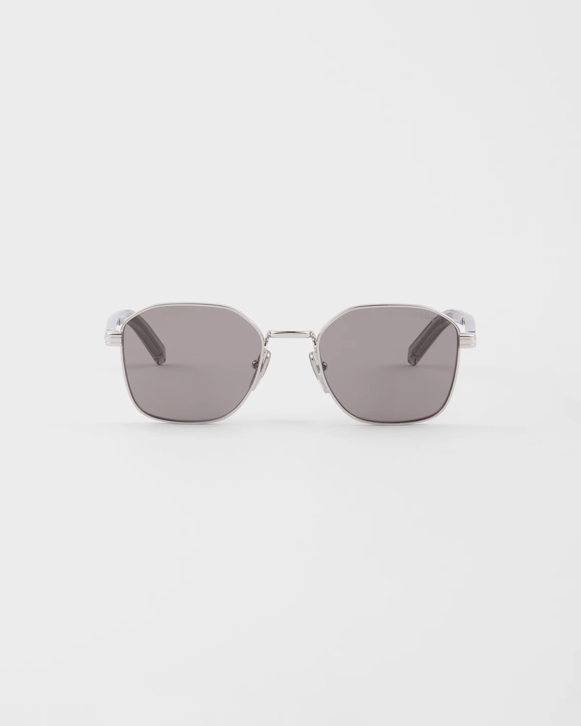 Prada Sunglasses With The Iconic Metal Plaque